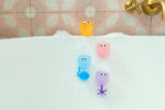 Munchkin Falls Bath Toy with Suction Cups|Multi-Colored Waterfall Bath Playset | Includes 3 Interactive Toys & 1 Pouring Cup | Fun Waterway for Tub Time - Image 7